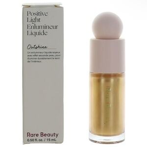 Rare beauty positive light liquid luminizer highlighter in outshine